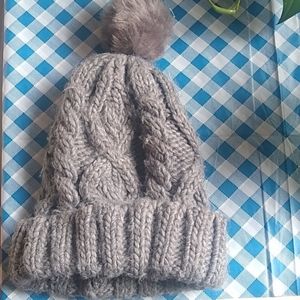 Cable knit beanie with pom pom